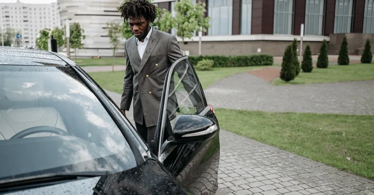 Driver opening executive car door